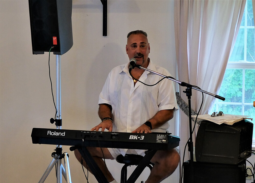 Musician Anthony Delvecchio kept everybody entertained with a variety of popular songs.